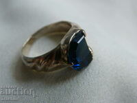 Old hand forged silver ring with blue spinel
