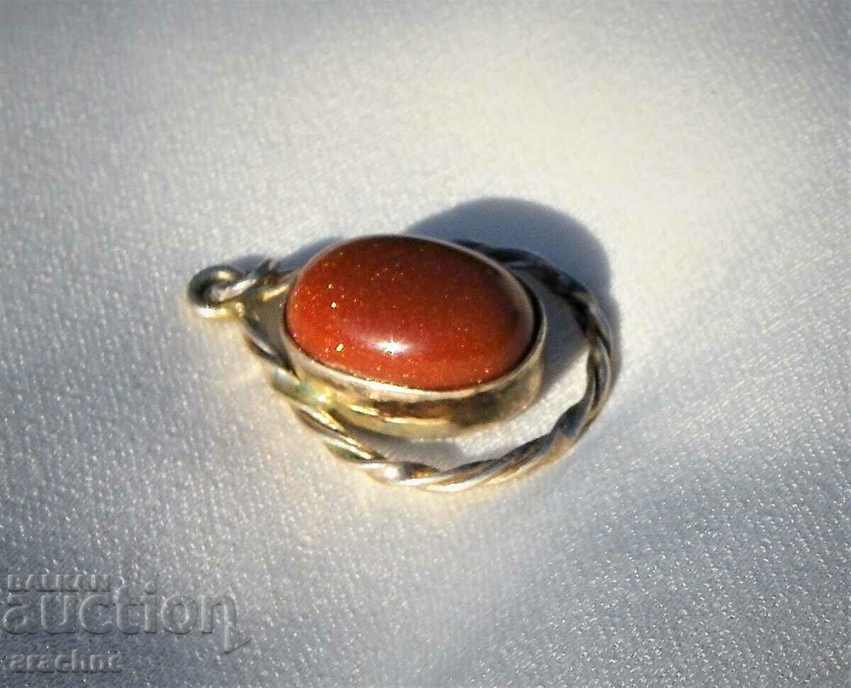 Auction Silver locket with brown aventurine Auction Silver locket with brown aventurine