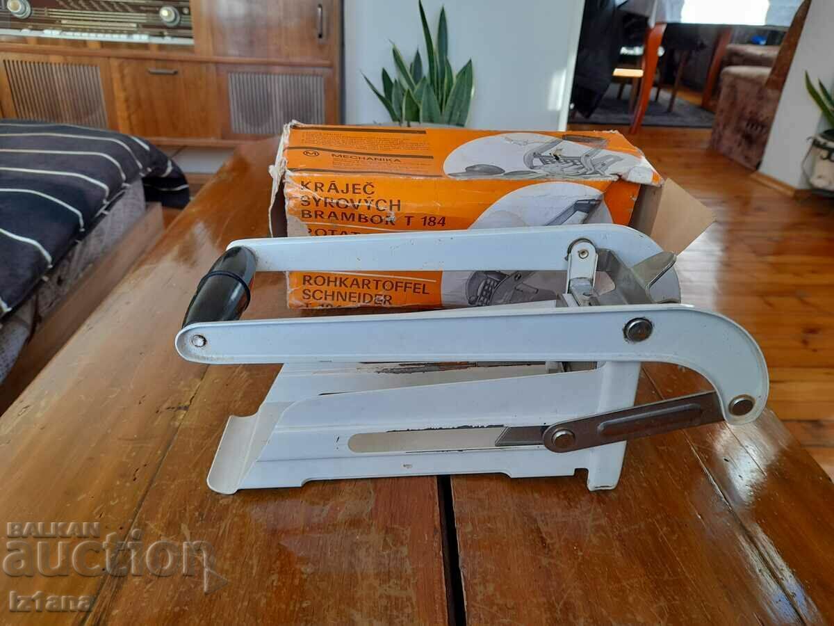 Auction Old kitchen appliance for cutting potatoes Auction Old kitchen appliance for cutting potatoes