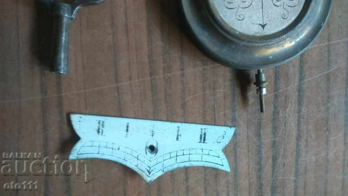 Auction  PENDULUM SIGN AND KEY FOR JUNGHANS WALL CLOCK