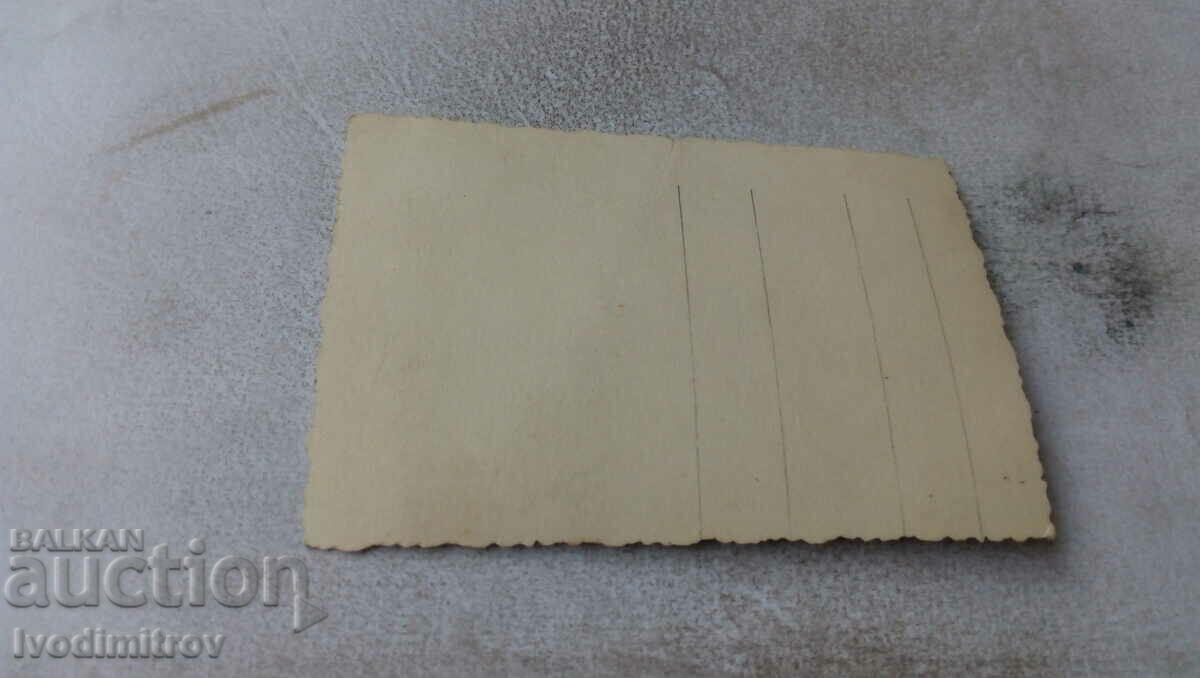 Снимка Двама мъже на брега на морето с цена € 1.25 | 2.44 лв.