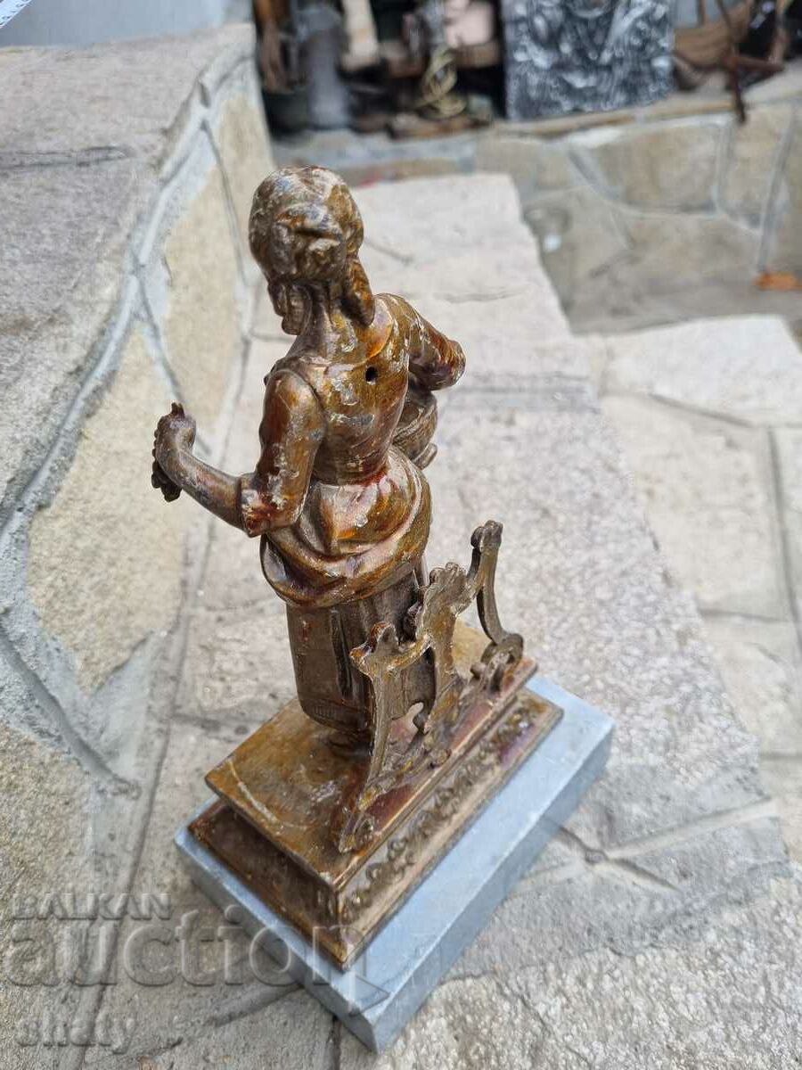 Old metal statue. Figure - 5 Old metal statue. Figure - 5