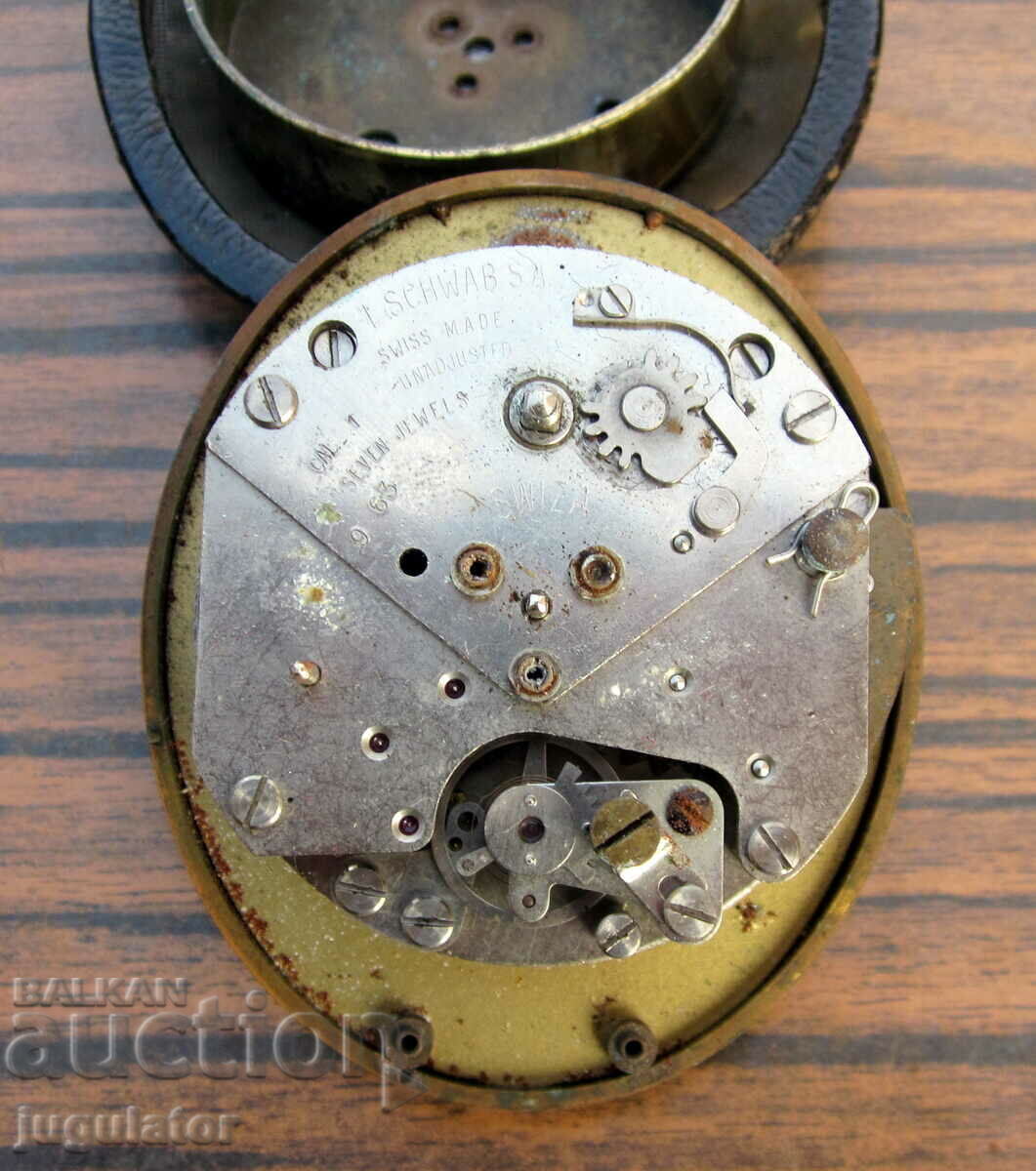 Delivery of old Swiss folding alarm clock swiza