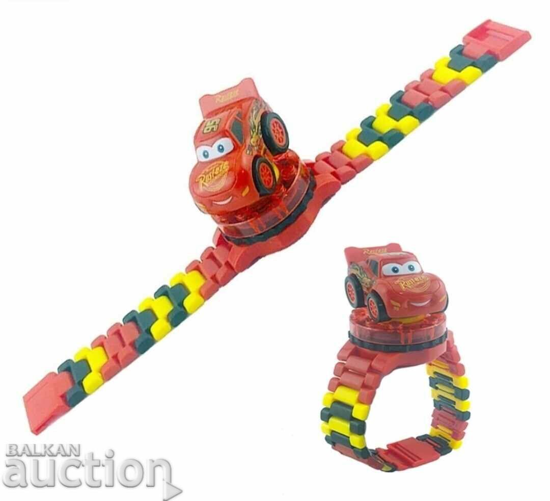 Children's watch with a toy figurine type Lego Cars Cars
