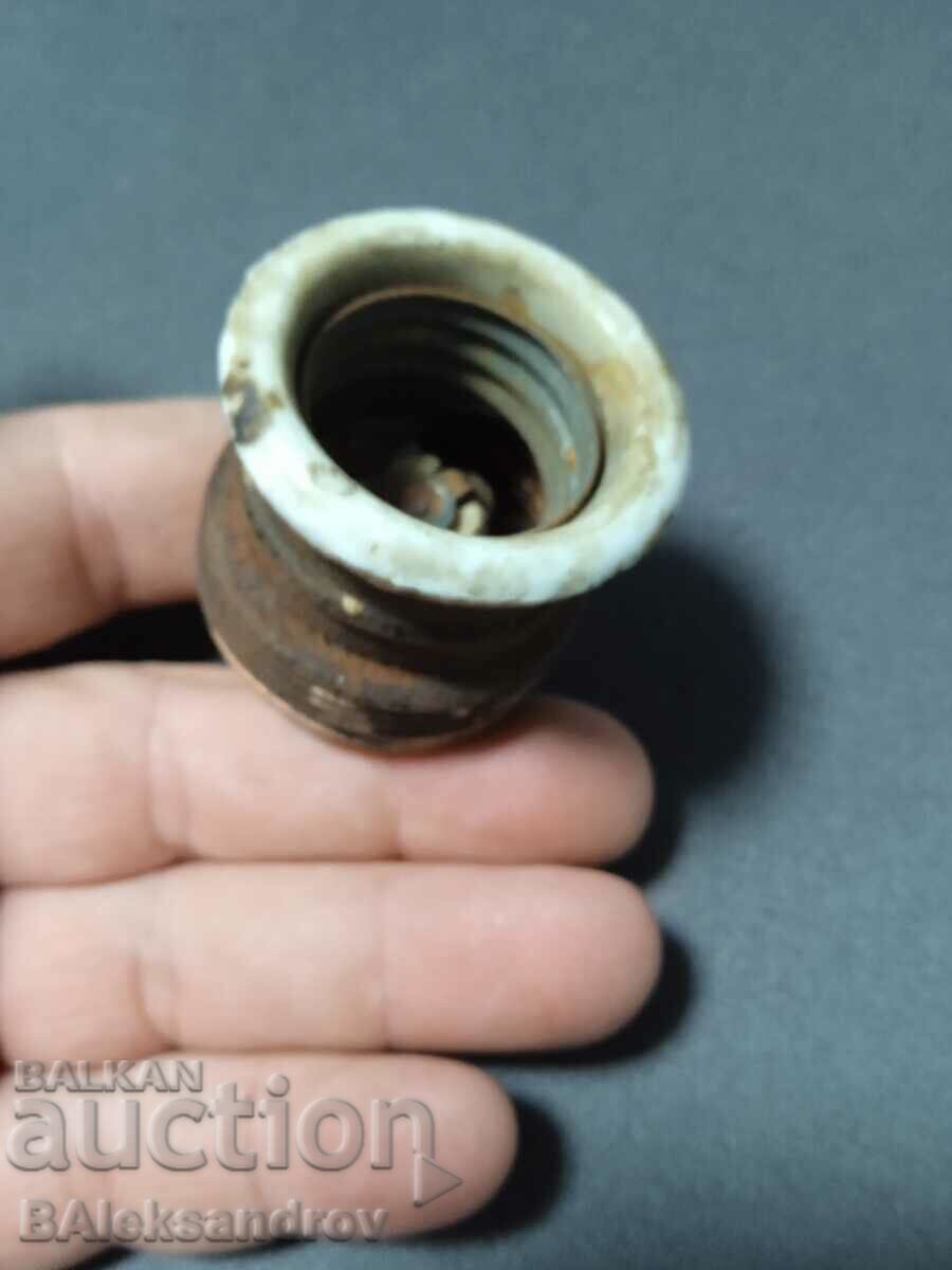Auction  Old ceramic socket