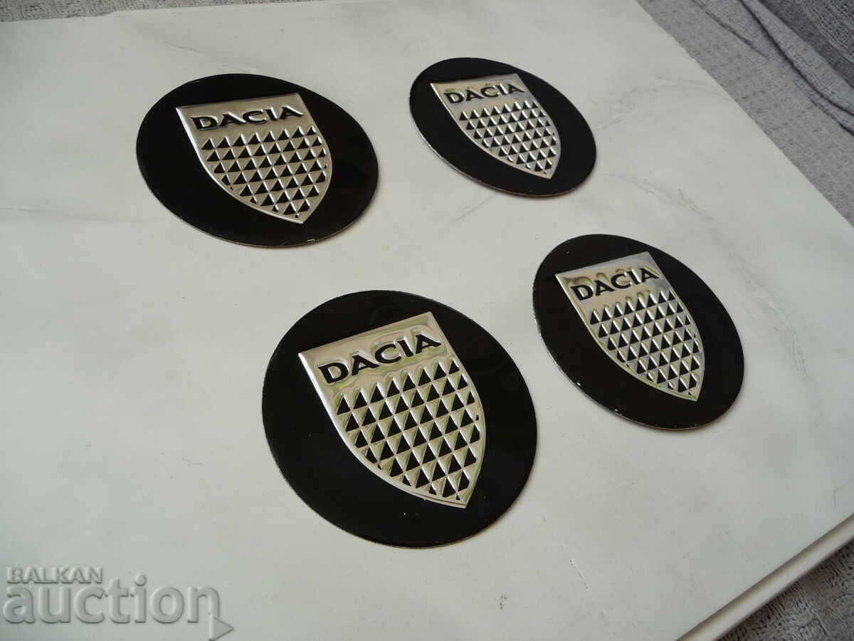 4 Dacia Dacia emblems, metal alloy wheels, alloy steering wheel with price 8.00 BGN | € 4.09
