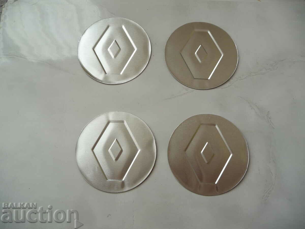 Auction 4 Renault emblems, metal alloy wheels, alloy steering wheel Auction 4 Renault emblems, metal alloy wheels, alloy steering wheel