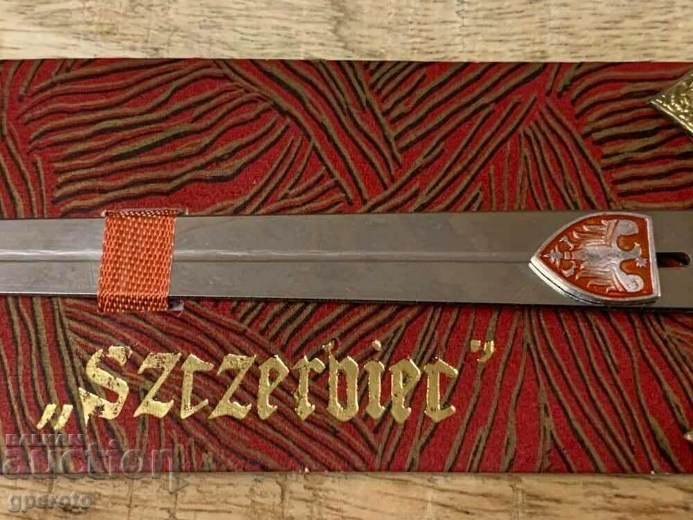 Old metal sword, letter knife with coat of arms with price 25.00 BGN | € 12.78 Old metal sword, letter knife with coat of arms with price 25.00 BGN | € 12.78