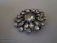 Old lady's brooch with crystal