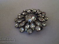 Old lady's brooch with crystal