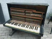 A small, old piano