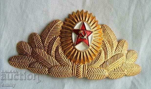 Old military cockade of an officer of the USSR - pentacle, sickle and hammer