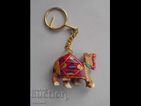 Keychain: wooden camel.