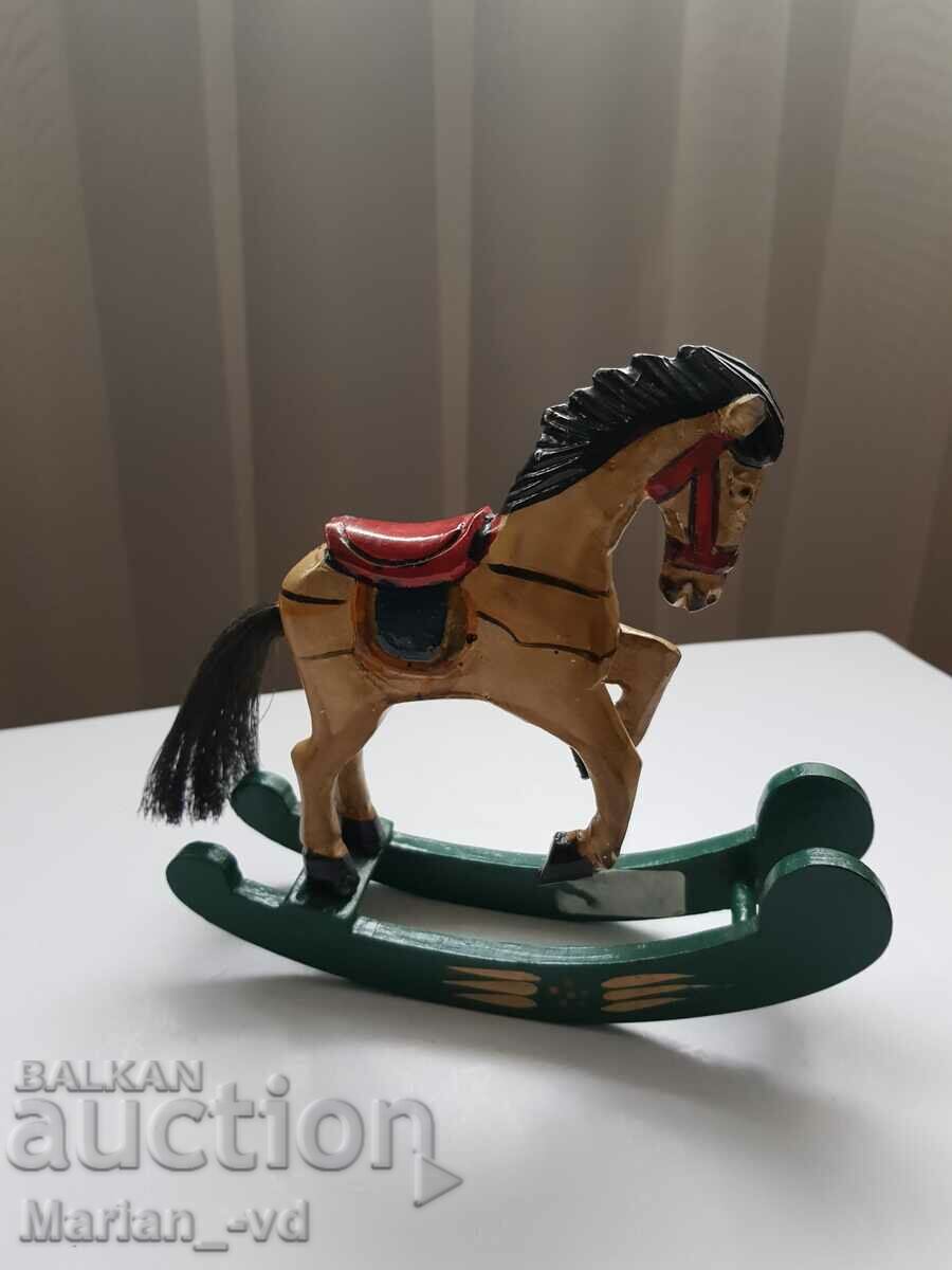 Old wooden horse toy figure carving
