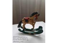Old wooden horse toy figure carving