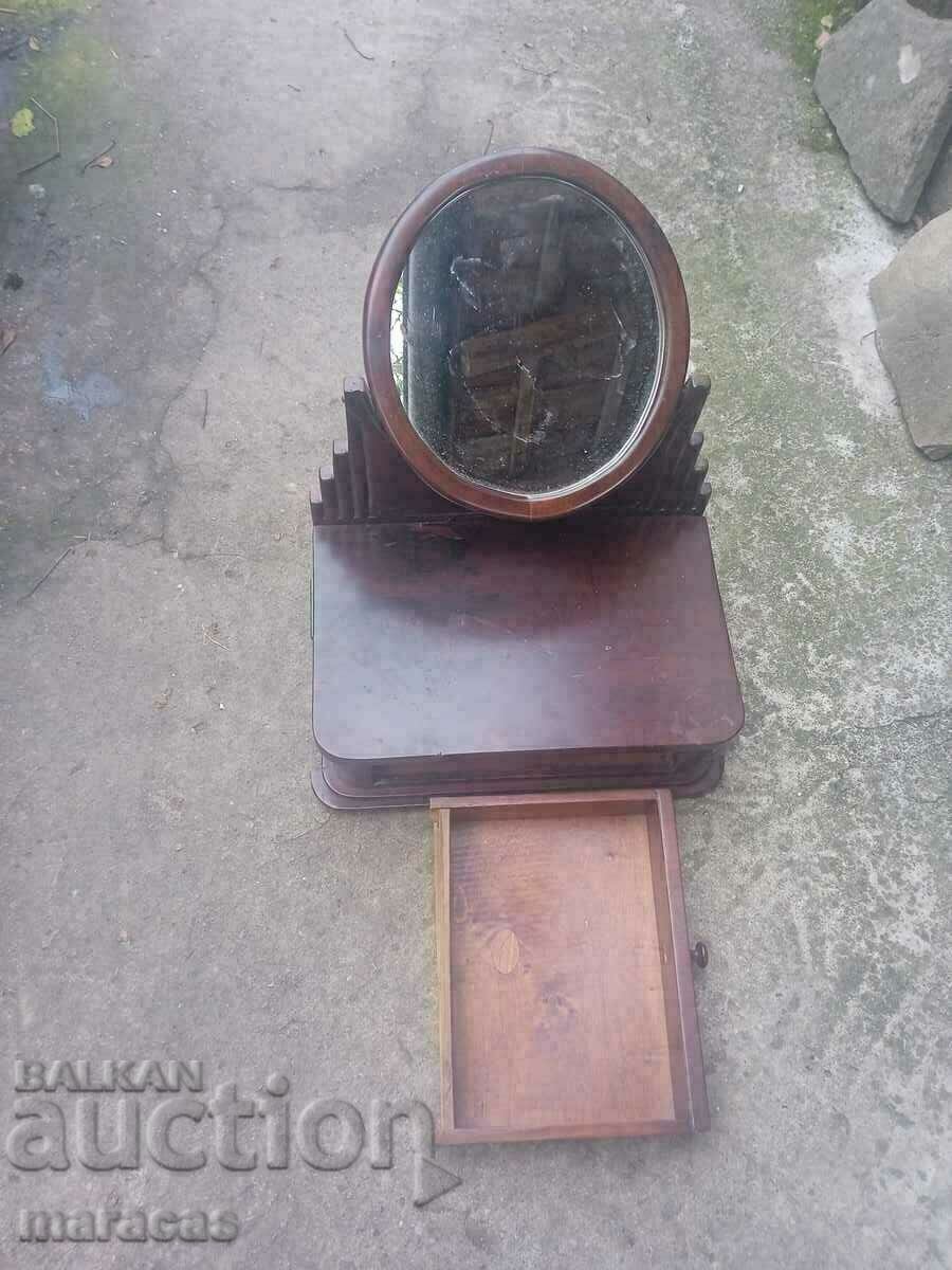 Old wooden dressing table with mirror
