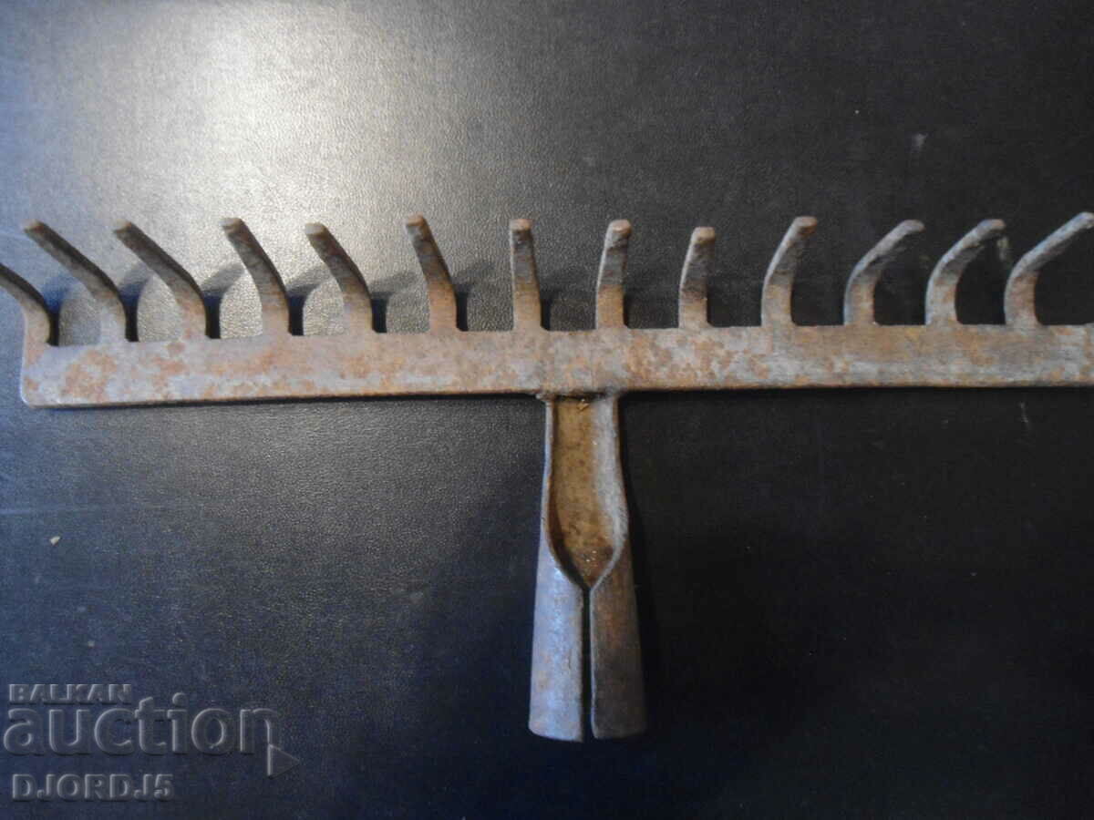 Auction  An old farm implement, indeed