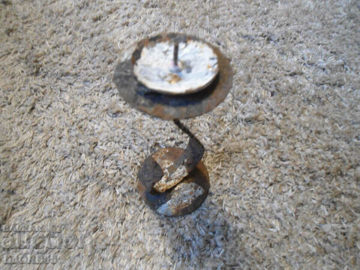 An old forged candlestick with price 3.00 BGN | € 1.53 An old forged candlestick with price 3.00 BGN | € 1.53