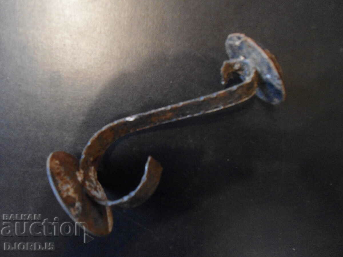 Auction An old forged candlestick Auction An old forged candlestick