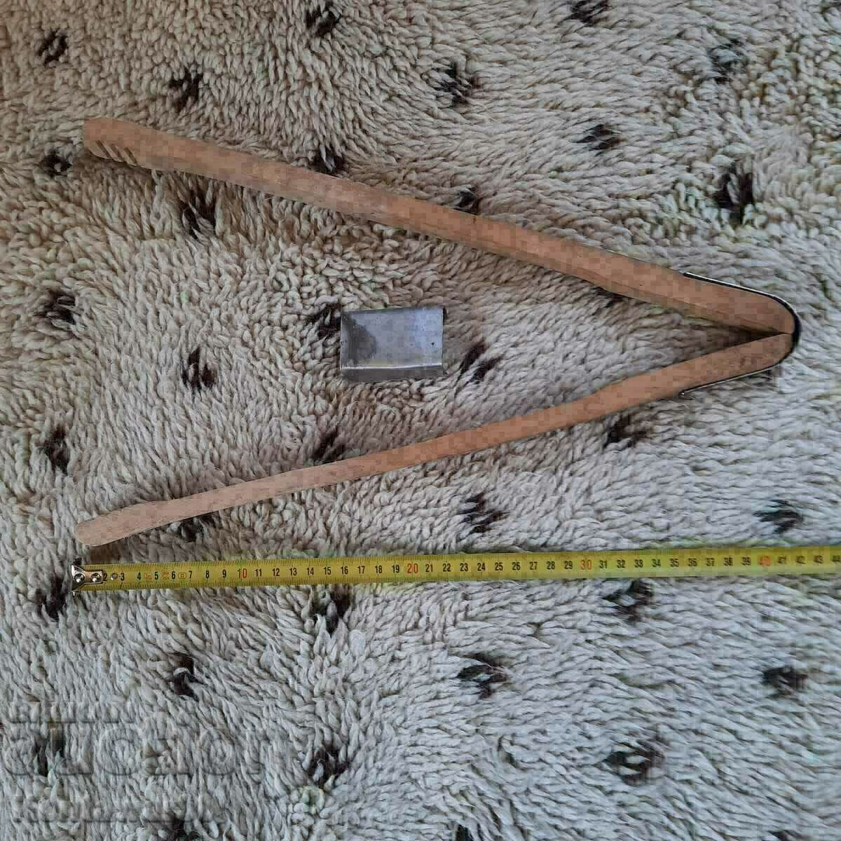 An old wooden peg. An old wooden peg.