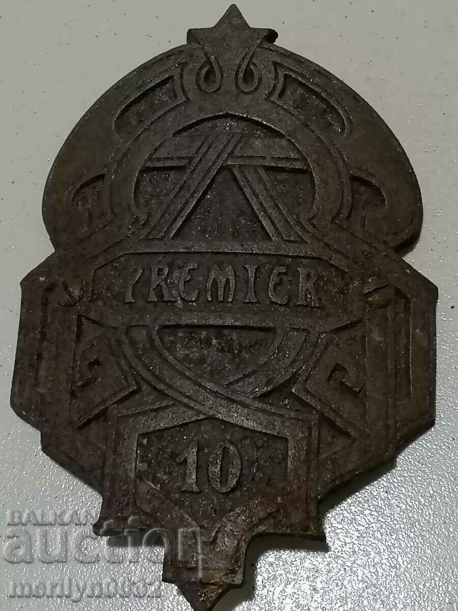 Cast iron emblem from an old fugular cast iron stove