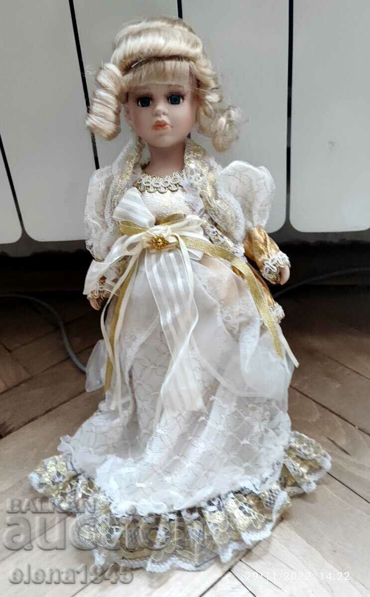 Porcelain doll with price 65.00 BGN | € 33.23 Porcelain doll with price 65.00 BGN | € 33.23