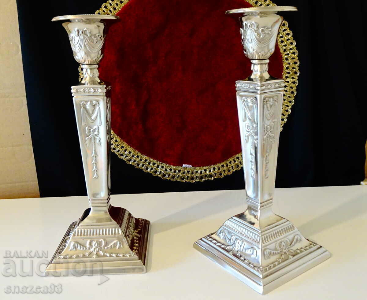 Silver-plated candlesticks, Aries, baroque. Silver-plated candlesticks, Aries, baroque.