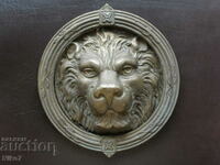 Ancient, bronze, massive castle-lion's head knocker.