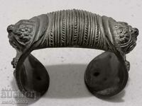 Revival-era bracelet, slingshot type, from a pouch, jewelry ornament