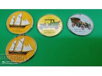 Old metal coasters with cars and boats