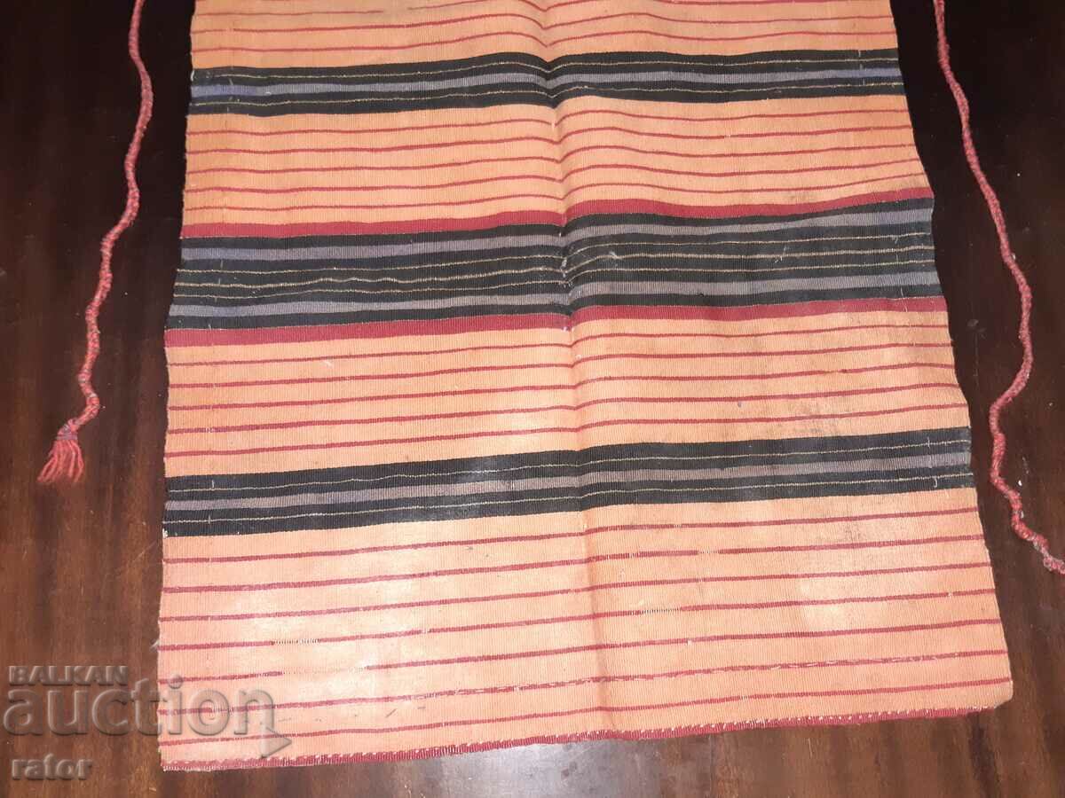 Delivery of Authentic woven apron, costume