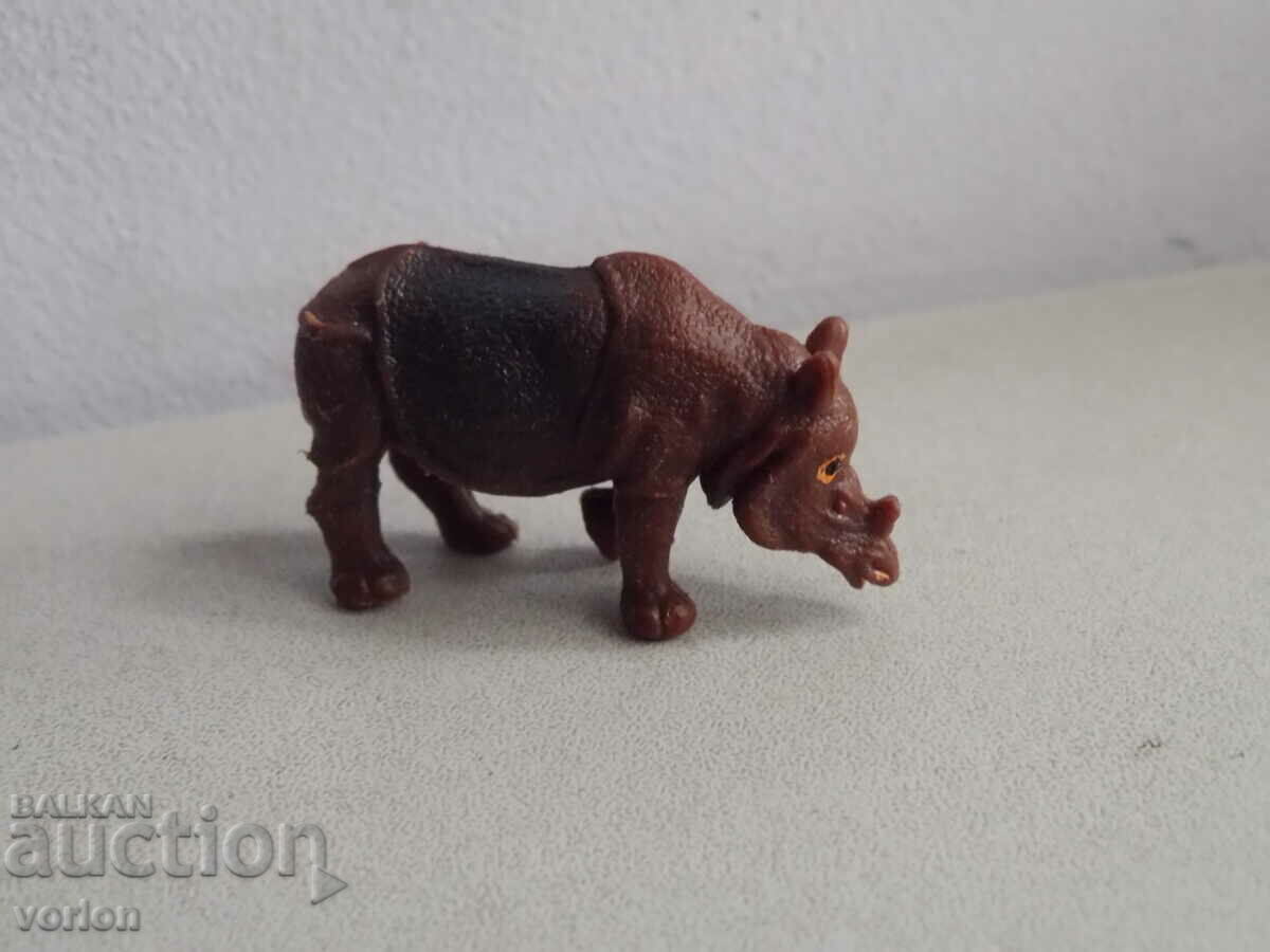 Figure, animals: rhinoceros - Singapore.