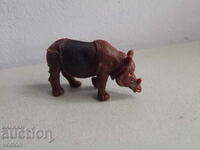 Figure, animals: rhinoceros - Singapore.