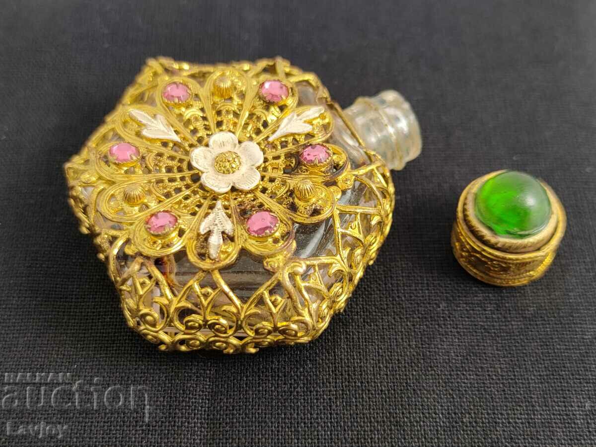 Openwork perfume bottle with gilding and stones with price 60.00 BGN | € 30.68 Openwork perfume bottle with gilding and stones with price 60.00 BGN | € 30.68