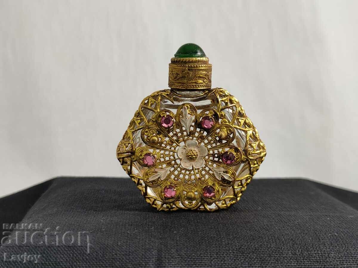Auction Openwork perfume bottle with gilding and stones Auction Openwork perfume bottle with gilding and stones