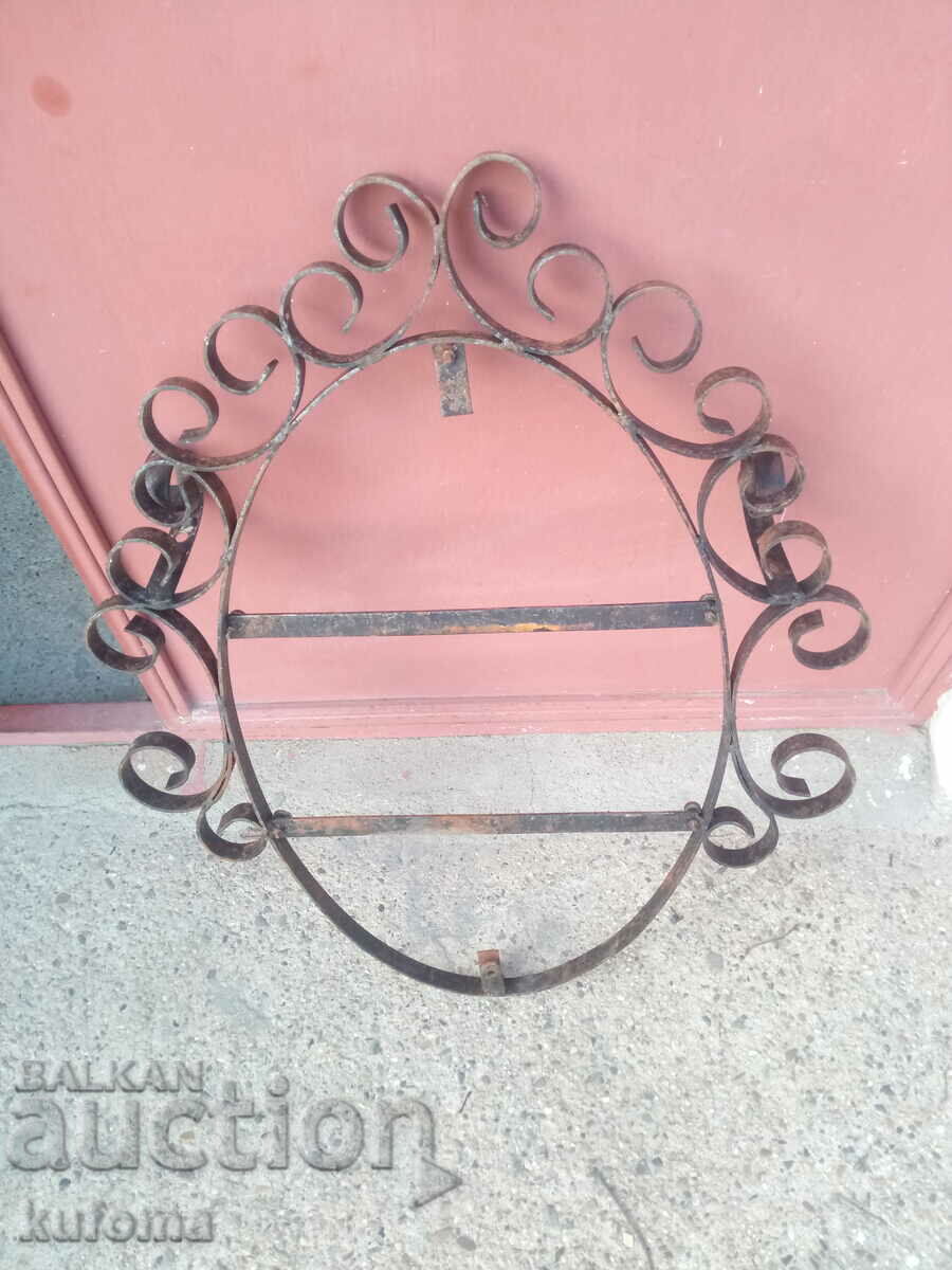 Old iron mirror frame