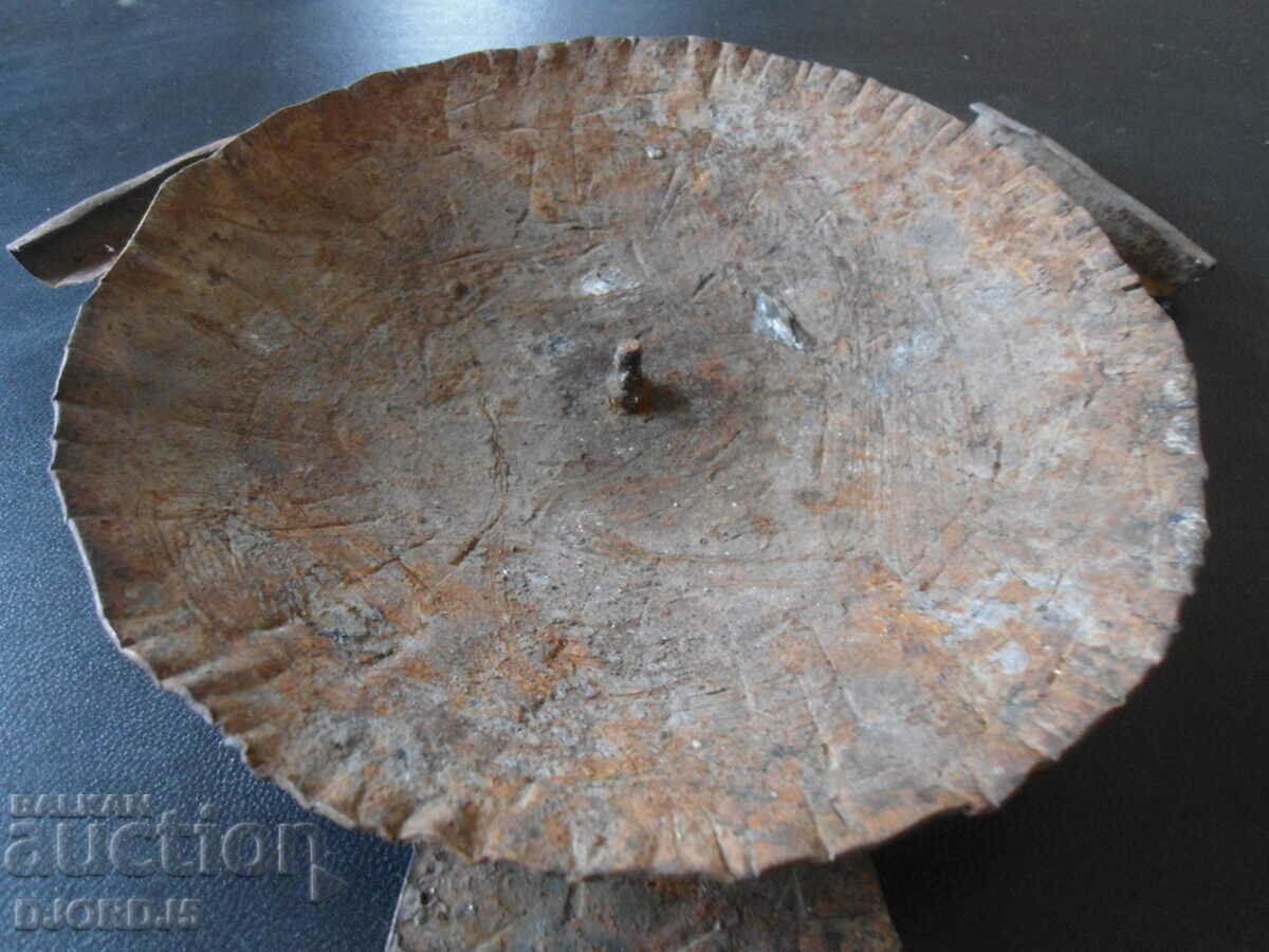 An old forged candlestick with price 4.00 BGN | € 2.05