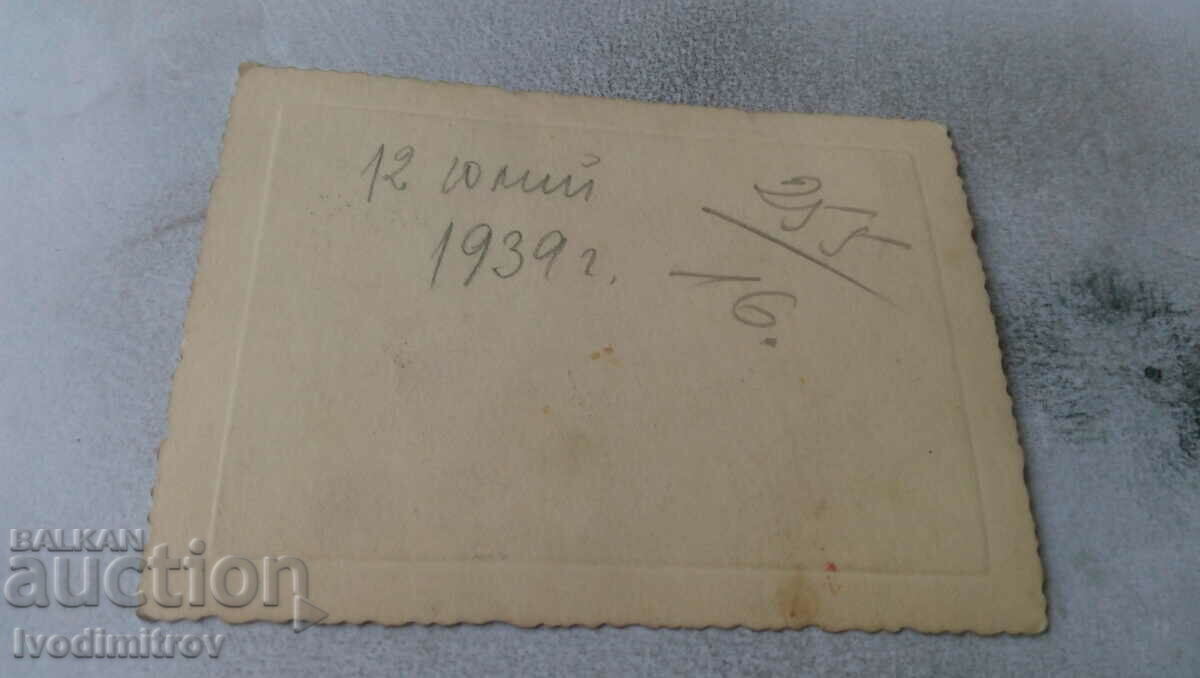 Photo Sofia Man and woman on the sidewalk 1939 with price 2.45 BGN | € 1.25 Photo Sofia Man and woman on the sidewalk 1939 with price 2.45 BGN | € 1.25