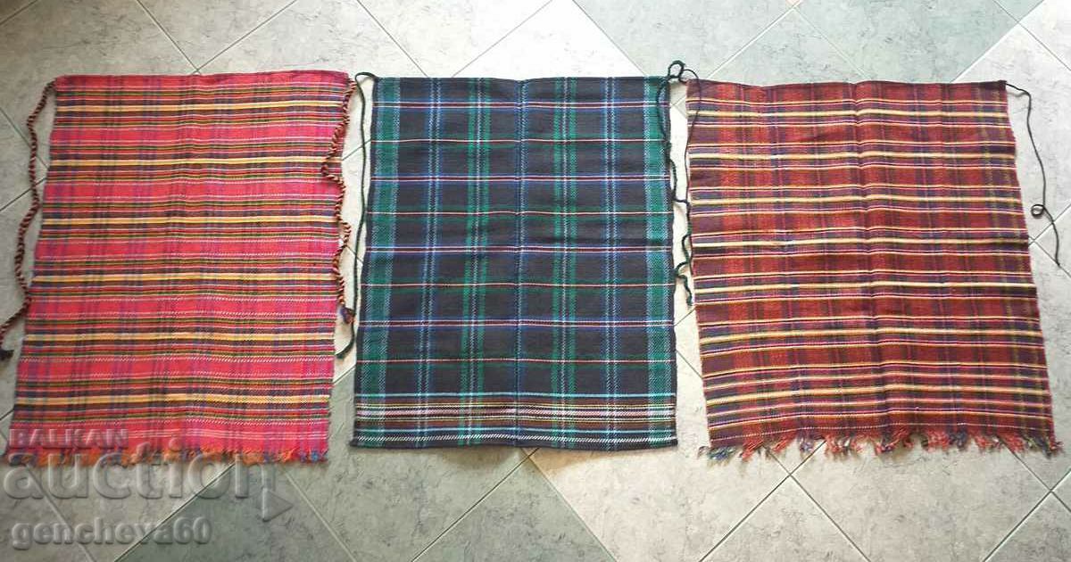 Three authentic woven costume aprons