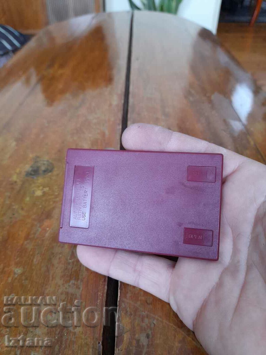 Delivery of Old electronic mini calculator