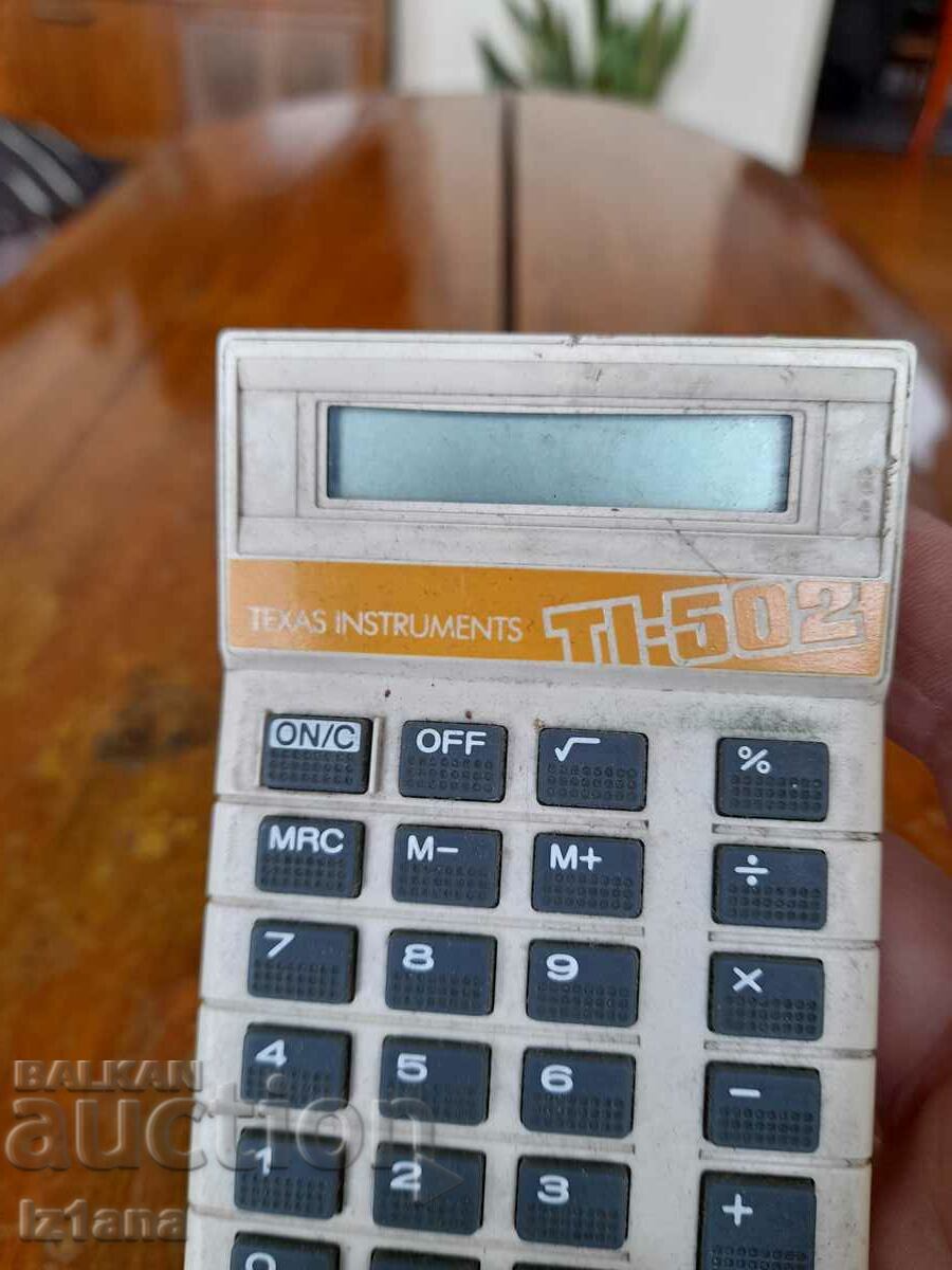 Auction  Old Texas Instruments calculator