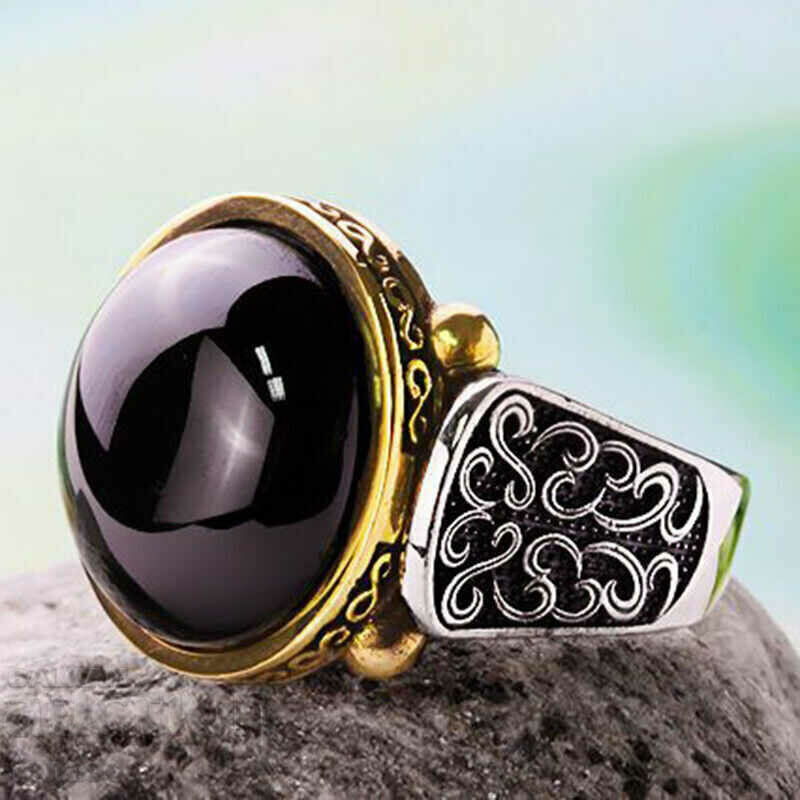 Women's ring with black opal