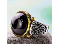 Women's ring with black opal