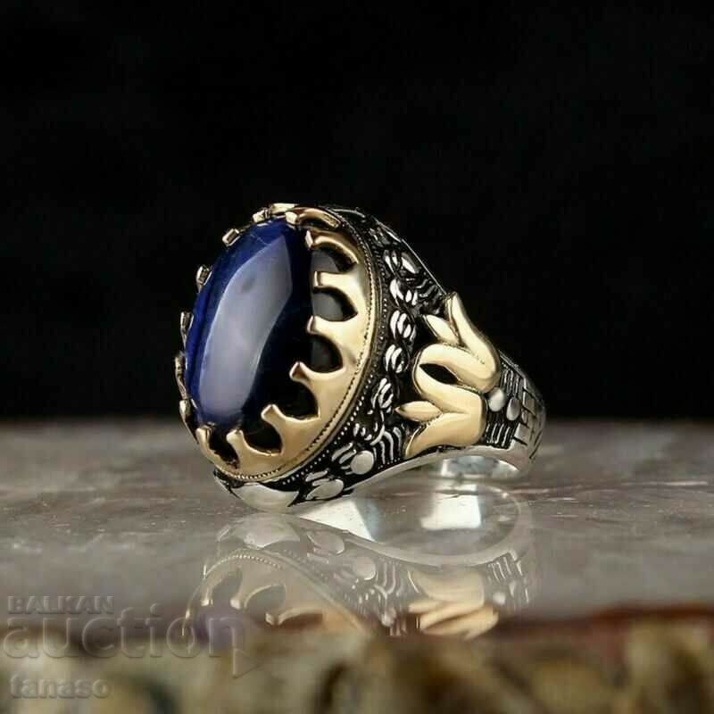 Дамски пръстен с тъмно син топаз