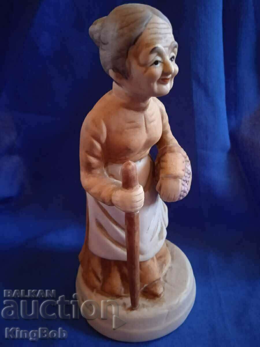 Delivery of EXCELLENT PORCELAIN FIGURE "GRANDMA COLLECTING HERBS" Delivery of EXCELLENT PORCELAIN FIGURE "GRANDMA COLLECTING HERBS"