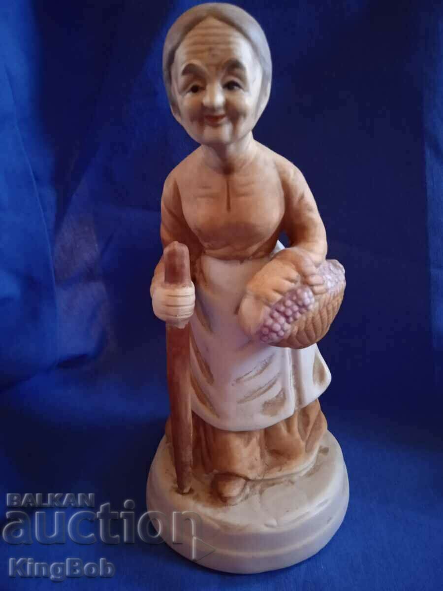 EXCELLENT PORCELAIN FIGURE "GRANDMA COLLECTING HERBS"