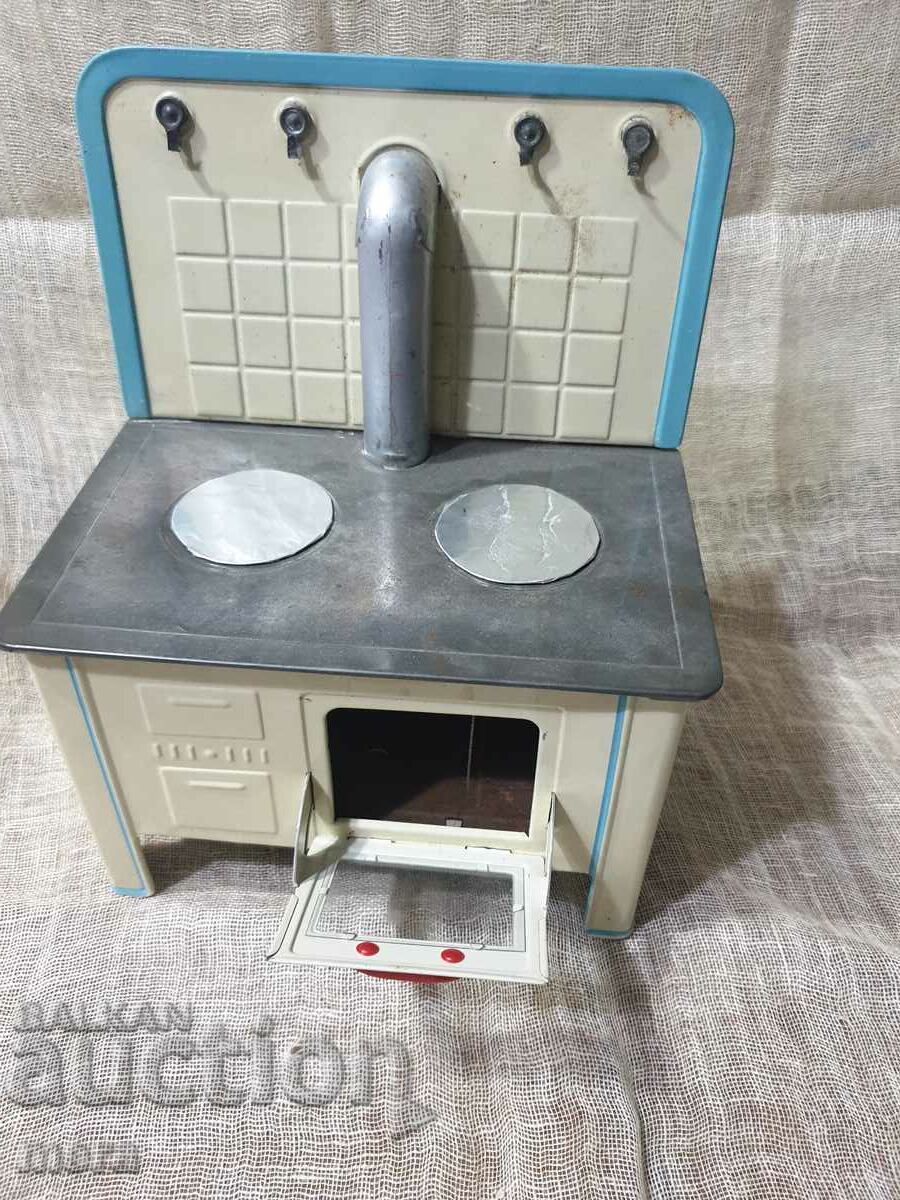 An old metal toy - a cooking stove with price 80.00 BGN | € 40.90 An old metal toy - a cooking stove with price 80.00 BGN | € 40.90