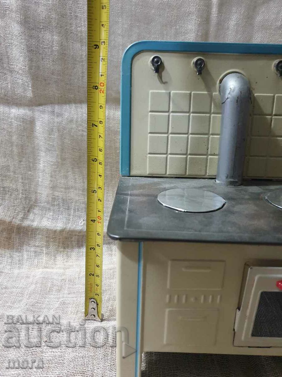 An old metal toy - a cooking stove - 5 An old metal toy - a cooking stove - 5