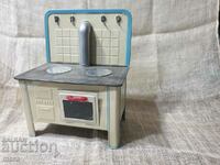 An old metal toy - a cooking stove