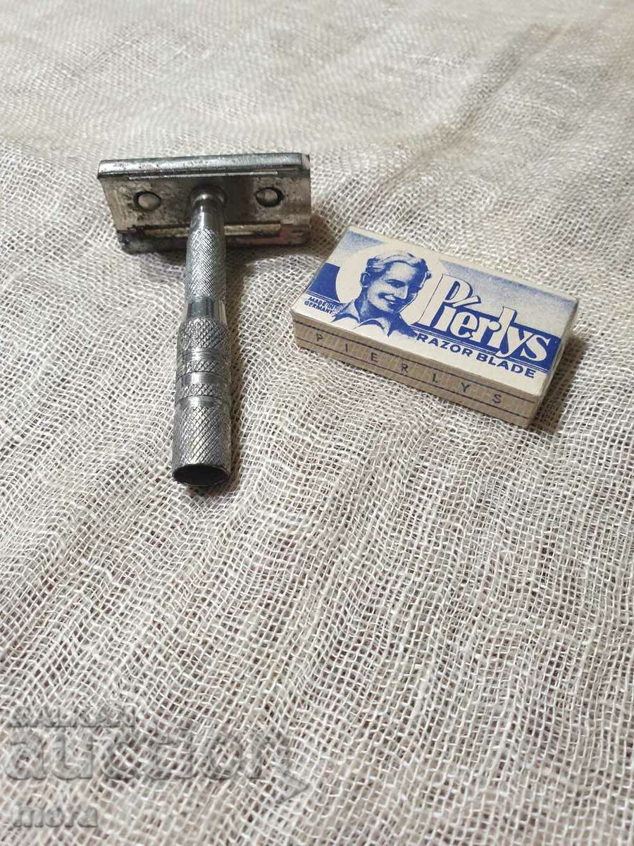 Delivery of Old retro razor with stack blades Delivery of Old retro razor with stack blades